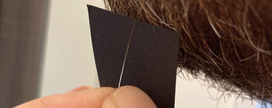 Trichologist Jason Small shows grey hair reversal on his beard hair