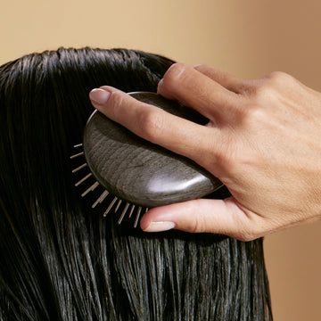 Scalp Brush in use